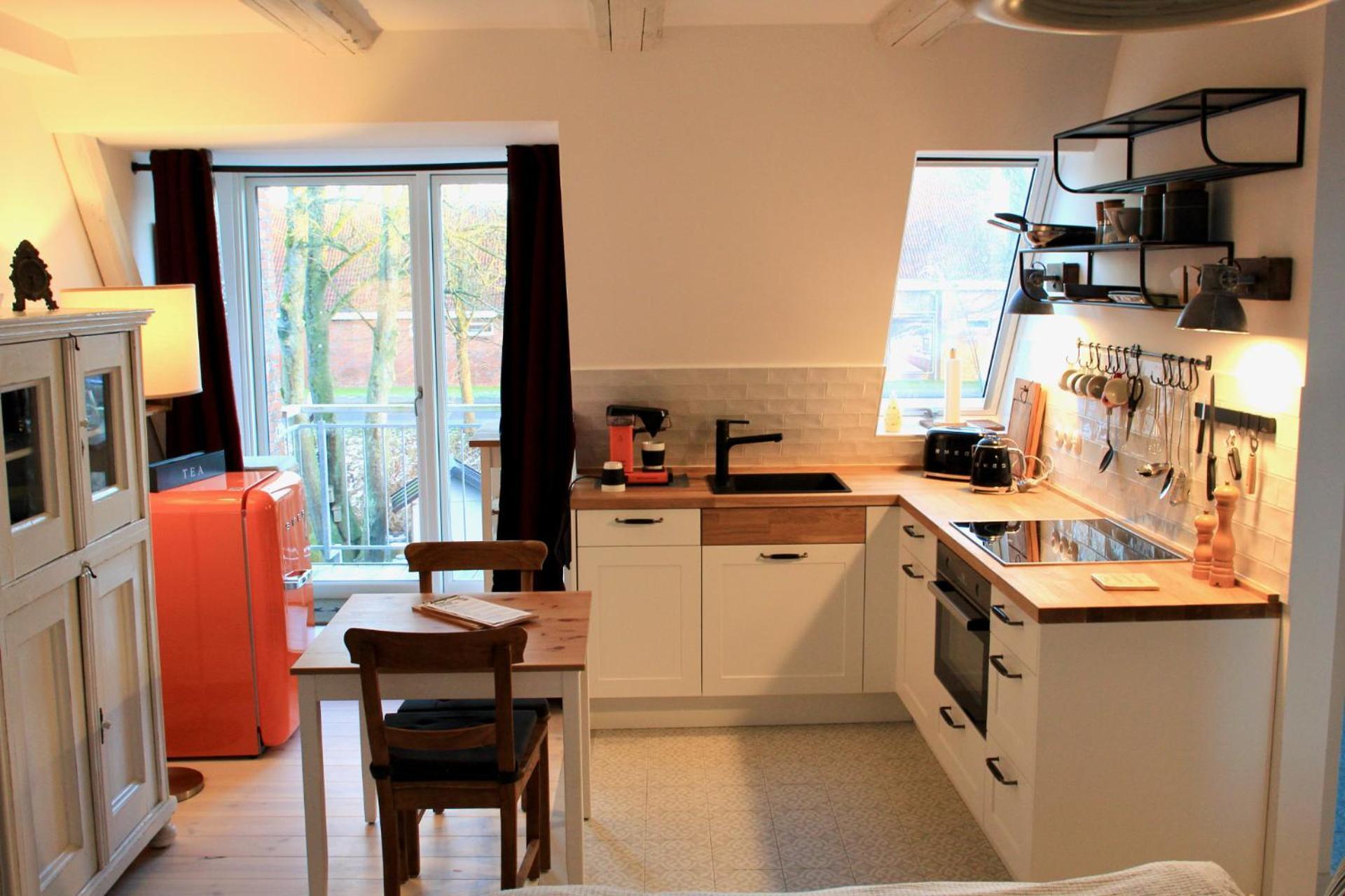 Gaestehaus Kajuete Direkt Am Wasser Friedrichstadt Extérieur photo